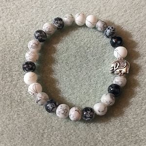 Silver elephant and glass bead bracelet